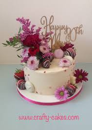 Flowers and strawberries on cake. Pretty 80th Birthday Cake Covered In Buttercream With Fresh Flowers And Dipped Strawberries 90th Birthday Cakes 80 Birthday Cake Buttercream Birthday Cake