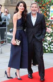 George clooney, who almost always wears armani but refuses to comment on his wardrobe, might sit front row at the designer's show, according to rumors circulating. Amal Clooney Style Look Pulled Together No Matter Where You Re Headed Glamour