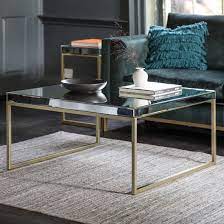 Unique contemporary coffee tables to inspire you coffeetable contemporarycoffeetable coffeeand mirrored gold table design athens low picture perfect home andreas champagne trim f d brands enrico white glass with stainless steel legs furniture in fashion detailing jade boutique furniture123 large. Champagne Gold Mirrored Coffee Table Primrose Plum