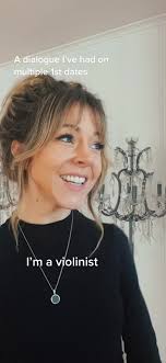 how many violins are in the background?