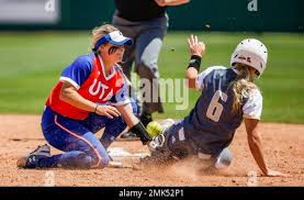 UT-Arlington junior shortstop Whitney Walton, left, is unable to tag out  ULM senior Victoria Pederson (6) at second during an NCAA softball game  Sunday, April 14, 2019 in Arlington, Texas. UTA won