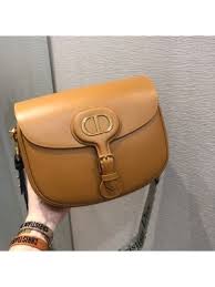 Pin On Top Designer Bag It celebrates both house codes with the cd monogram atop the buckle. pin on top designer bag