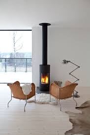 30 Stunning Scandinavian Fireplace Design Ideas To Amaze Your Guests Scandinavian Fireplace Fireplace Design Freestanding Fireplace