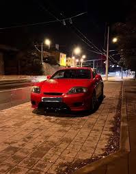 Image result for Electric Red 2005 Tiburon
