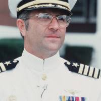 Rear Admiral (lower half) Robert E. Traister, USN (uncovered)