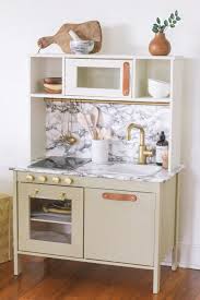 This Ikea Play Kitchen Hack Uses Marble Ikea Play Kitchen Ikea Kids Kitchen Play Kitchen