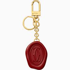 La fête des pères est une fête annuelle célébrée en l'honneur des pères dans de nombreux pays. Crog000465 Porte Cles Cachet De Cire Diabolo De Cartier Metal Laque Et Finition Doree Cartier