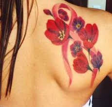 While we traditionally think of cancer ribbons as being colored to represent a particular illness, a symbolizing hope, rebirth, love and friendship, cancer ribbon tattoos with flowers are a timeless combination. Ribbon Tattoos Tattoo Designs Ideas For Man And Woman