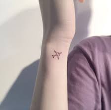 Small Airplane By Playground Tattoo Elegant Tattoos Travel Tattoo Small Airplane Tattoos