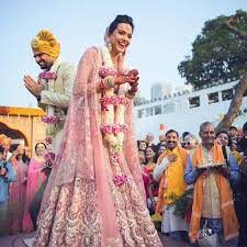 Interestingly, this master couturier also makes a strong case for a sartorial lightness of being. Tarun Tahiliani Bride Kanika Looks Elegant And Fresh In Subtle Shades Of Pink For Her Day Wedding Photograph Bride Beautiful Bride Bridal Makeover