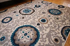 Let rug & home turn your house into a home with our collection of hundreds of large area rugs for your living room, bedroom, or any large room. Generations Pre8034beige 8x11 New Contemporary Circles And Flowers Modern Area Rug 8 X 10 2 Beige Navy Coral Blue Grey Buy Online In Bahamas At Bahamas Desertcart Com Productid 13628383