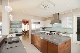 Kitchen renovation featuring fabuwood galaxy frost cabinetry, msi calacatta laza quartz countertops and full height backsplash, and florida tile alaska floor tile. Quartz Countertops The Eye Catcher In Every Kitchen