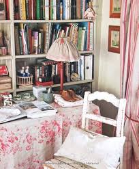 A Quaint Cluttered English Corner Featuring Cabbages And Roses Fabric On Table Home Elegant Homes English Decor