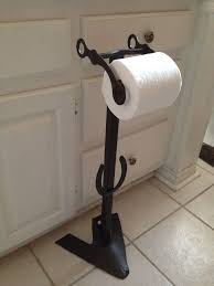 Practicality is incorporated in the form of being a toilet holder and a dispenser at the same time. Standing Toilet Paper Holder Making Toilet Paper Holder Toilet Paper Holder Stand Toilet Paper Stand