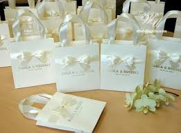 50 Ivory Wedding Gift Bags With Satin Ribbon Bow And Silver Foil Names Elegant Personalized Paper Bag Custom Wedding Welcome Bags Wedding Gift Bags Luxury Wedding Gifts Diy Wedding Gifts