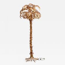 Its square silhouette blends effortlessly into aesthetic, while its palm leaf pattern makes it pop. Hans Kogl Huge Vintage Golden Palm Tree Floor Lamp By Hans Kogl Circa 1980s