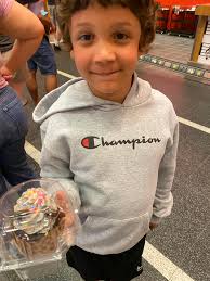 Cast member surprises guest with balloon at Disney