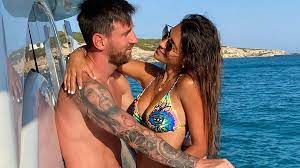 PSG star Lionel Messi shares raunchy snog with bikini-clad wife while on  yacht holiday - Daily Star