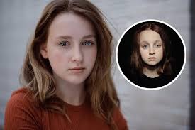 Why is Eliza said to be an orphan if she has biological parents?