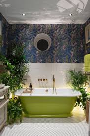 Bathroom tiles are an easy way to update your bathroom plain, coloured tiles, either on the floor or on the bathroom walls, will look chic and sophisticated. 10 Ideas For Dramatic Bathroom Walls