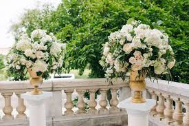 Place one flower in the center of the oasis. How To Make Gorgeous Tall Floral Arrangements