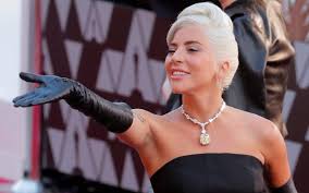 Lady gaga told zane lowe on beats1 radio that diamond heart is about chasing the american dream, and doing whatever it takes to achieve it. The 128 Carat Yellow Diamond Worn By Lady Gaga Audrey Hepburn And Now Gal Gadot