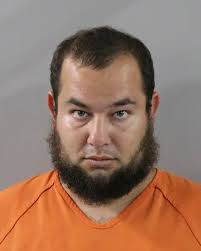 31-year-old BRIAN COTTO from Polk County was booked