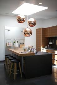 Bespoke lights have put together a wonderful collection of copper lights that include indoor and outdoor light fittings, copper pendants and copper kitchen island lights, and some attractive beaten or hammered copper. Black And Copper Kitchen Ideas Modern Extravagant And Bold Designs