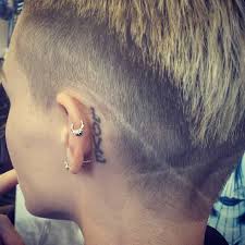 Rose came to attention as a presenter on mtv australia, foll. Celebritattoo Ruby Rose Love Tattoo Behind Ruby Rose S Left