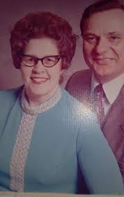 Thanks for letting me join i loved the 70s this is my mom sadly passed now  and me around 1973 I remember the dress and loved the hair style before  this i