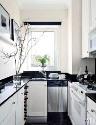 Custom cabinetry creates light and airy kitchen. 25 Black Countertops To Inspire Your Kitchen Renovation Galley Kitchen Design Small Galley Kitchen Designs Small Galley Kitchens