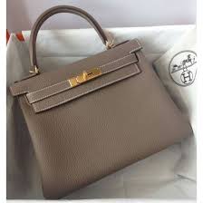 In a famous photograph taken in 1956, grace kelly is shown carrying this hermès bag. Hermes Kelly 28 Retourne Etoupe Togo Gold Hardware D Vendome Monte Carlo