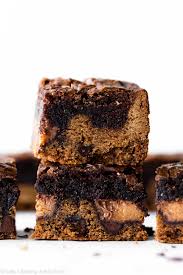 Chocolate Chip Cookie Brownie Bars With Peanut Butter Cups Stuffed Inside This 9x13 Inch Pan Of Chocolate Chip Cookie Brownies Cookie Brownie Bars Brownie Bar