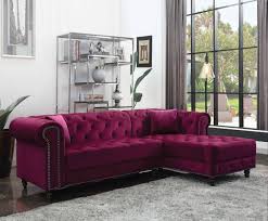 Founded a top four legs in a warm brown stain, this piece is crafted with a solid and manufactured wood frame, foam fill, and coil spring supports to provide cushioning as you kickback. Adnelis Sectional Sofa 57315 In Red Velvet By Acme
