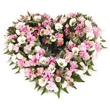These arrangements are appropriate for a spouse or immediate family member to send to the service. Pink Open Heart Funeral Arrangement Created By The Harvest Garden And Delivered