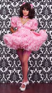 Initially she was kept as a mate but finally she gave up and now she is a slave to her master and mistress couple. Sissy Dresses