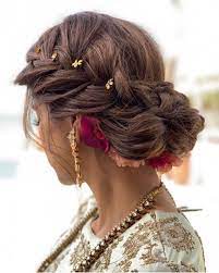 Shag haircuts, which have a total rock 'n' roll vibe, are marked by lots and lots of layers—specifically near the crown of your head—as well as choppy ends. Garba Hairstyles Navratri Hairstyles Navratri Inspiration Side Bun Hairstyles Indian Hairstyles Hair Styles