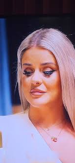 This girl and her lashes . She looks like a stuffie lol