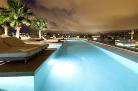 Sb Glow Barcelona Swimming Pool On The Rooftop By Night Barcelona Hotels Pool Swimming Pools