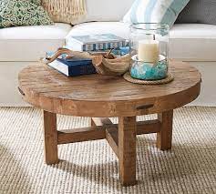 Marietta Round Coffee Table Solid Reclaimed Wood Gives The Marietta Round Coffee Table Its Rustic Appeal Coffee Table Coffee Table Vintage Round Coffee Table