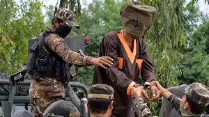 Soldiers move through snow in logar province; Tajik Man Emerges In Afghanistan As Leader Of Is Unit Of Central Asian Fighters