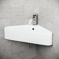small corner ceramic cloakroom basin