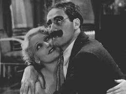 Hosting the show were johnny niceguy, who didn't look at all like a used car salesman, and his lovely assistant kat. The Only Great Party Is A Boy And A Girl And A Whole Cheesecake An Interview With Groucho Marx Interviews Roger Ebert