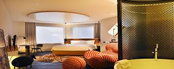 4 Unique Design Hotels In Singapore Featuring Naumi Hotel Wanderlust Hotel Village Hotel Katong And The S Hotels Design Hotel Room Design Small Luxury Hotels