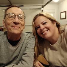 Where can I find a non-white wedding dress in West Michigan, such as merlot  or royal blue?