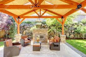 Manufactured using a combination of high strength polyester top panel, plus innovative, multi layer, breathable side panels to help eliminate condensation. Exterior Covered Patio With Fireplace And Furniture Wood Ceiling Stock Photo Picture And Royalty Free Image Image 17749956