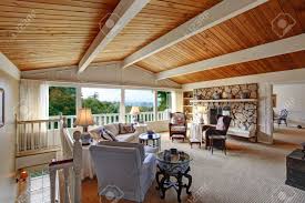 Wood plank ceiling was a given challenge when updating my kitchen. Old Fashion Living Room With Vaulted Wood Plank Ceiling Walkout Deck And Rocky Fireplace View Of Antique Furniture Stock Photo Picture And Royalty Free Image Image 29735687