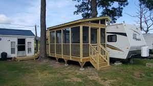 The lance 2445 travel trailer has plenty of space for the whole family! Porch On A Camper By Leisure Time Decking Greensboro Nc Porch For Camper Porch For Rv Camper Porch