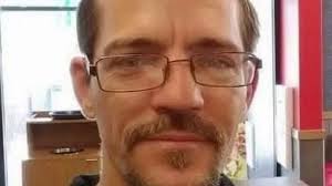 Man arrested week after woman and two girls, 12 and 13, found shot to death  inside home