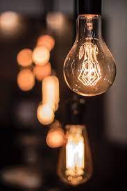 Vintage Lightbulb Inside A Coffee Sho Hd Photo By Joshua Melo Ajoshuamelo On Unsplash Light Bulb Art Bulb Photography Vintage Light Bulbs